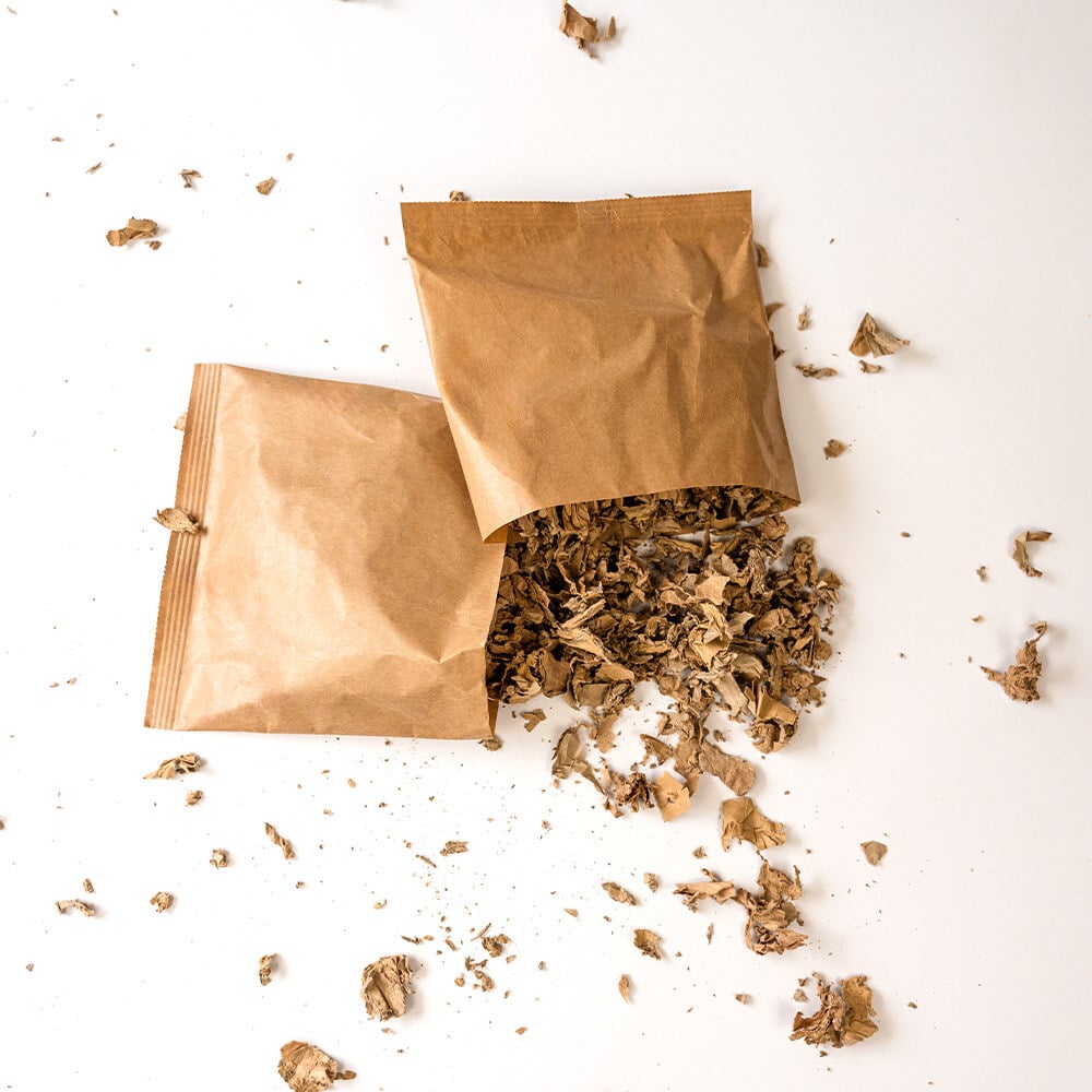 Polsterkissen aus zerkleinerter Altkartonage