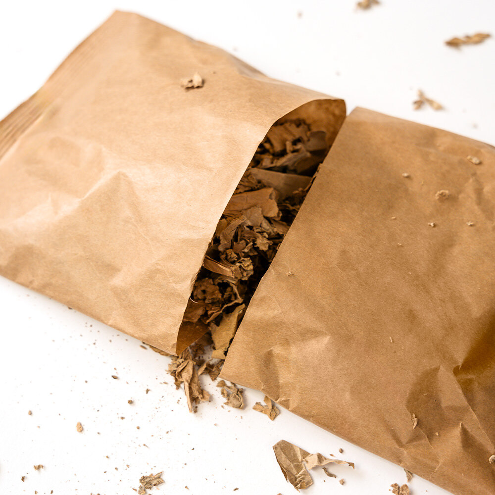 Polsterkissen aus zerkleinerter Altkartonage